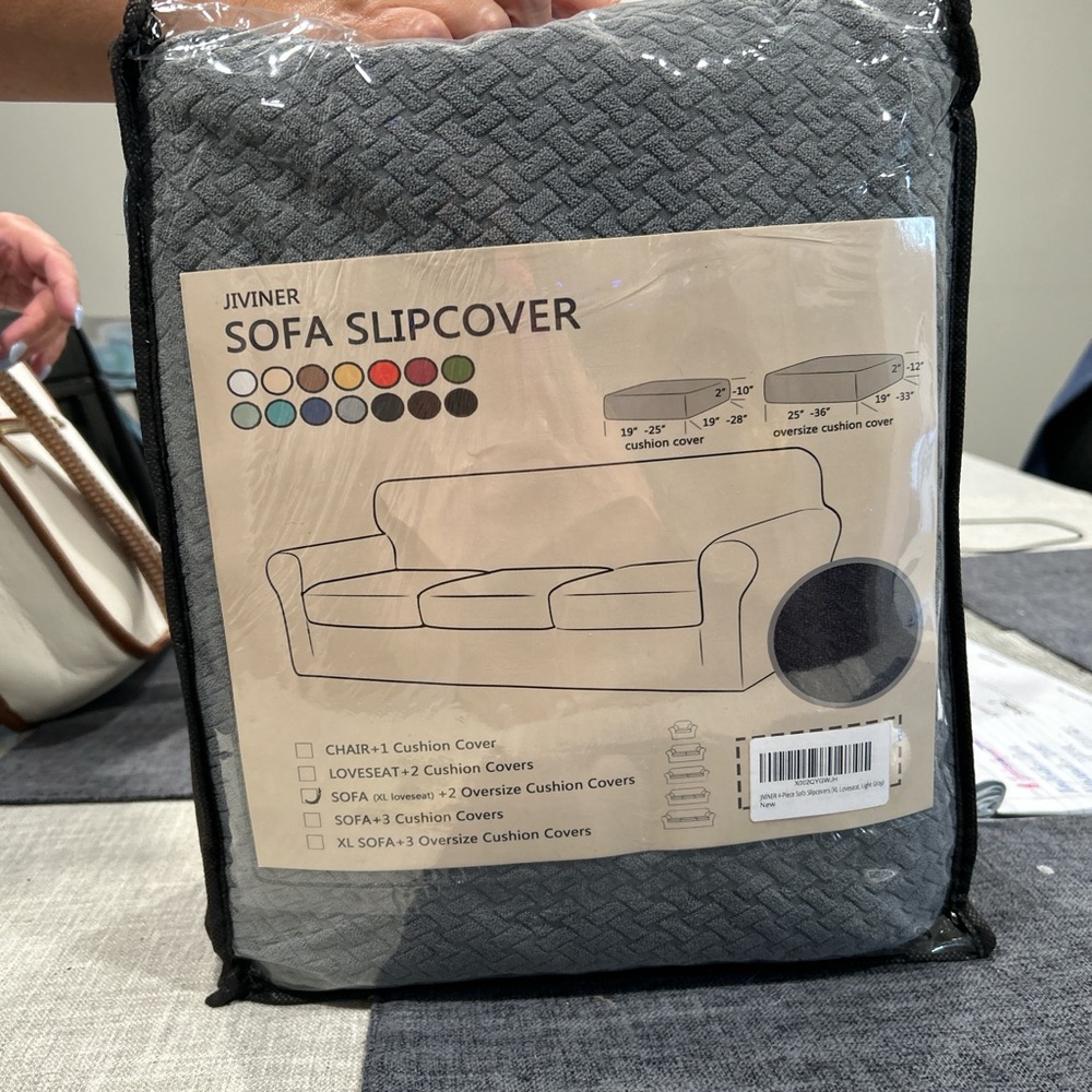 Sofa slip cover. Brand new never used before. Bought the wrong size, for sale!
